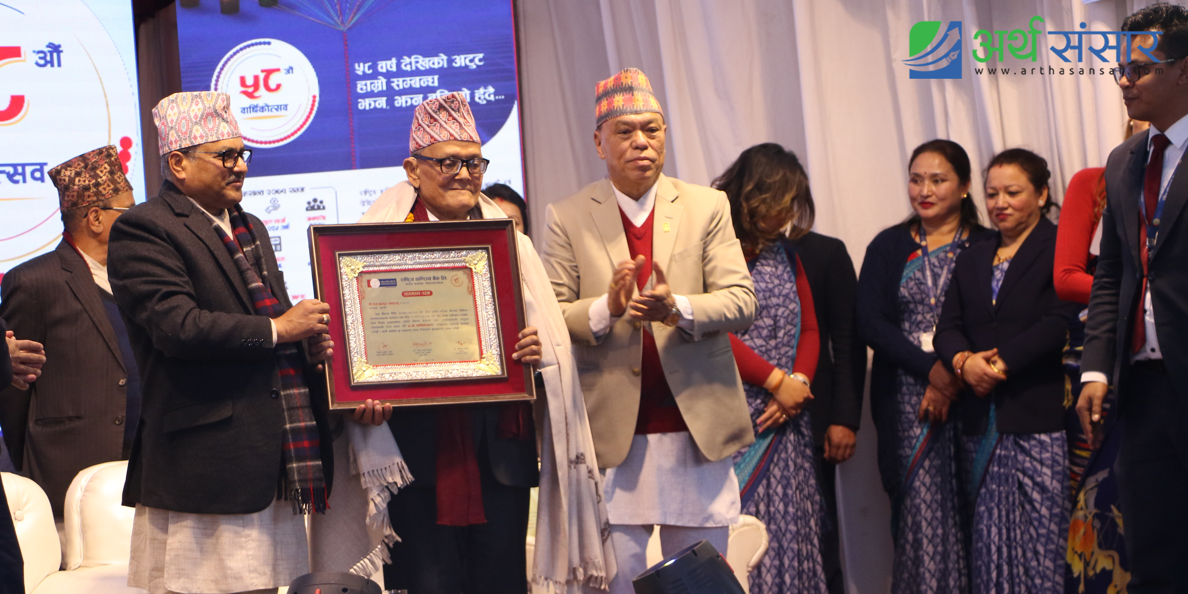 १२ तस्विरमा हेर्नुस् राष्ट्रिय वाणिज्य बैंकको वार्षिकोत्सव समारोह